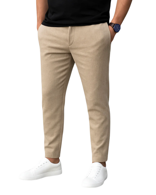 Men's beige slim fit trousers with black shirt and white sneakers — front view
