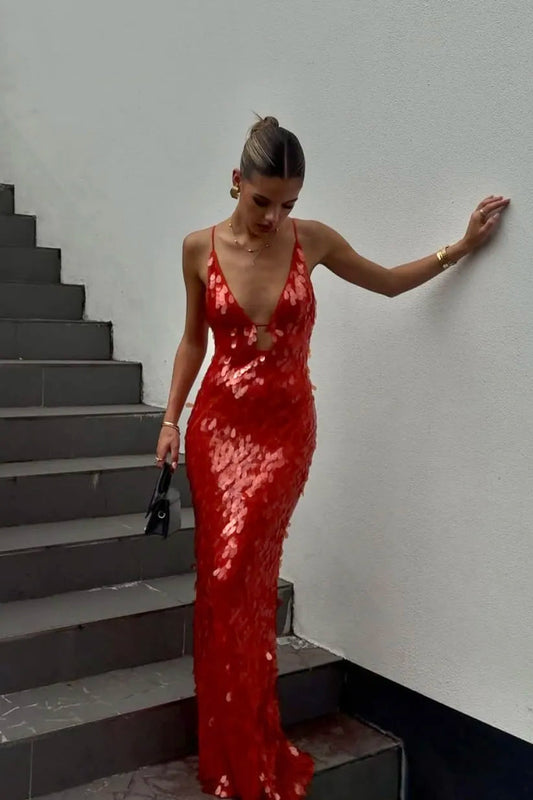 Red sequin evening maxi dress with plunging neckline — front view on model